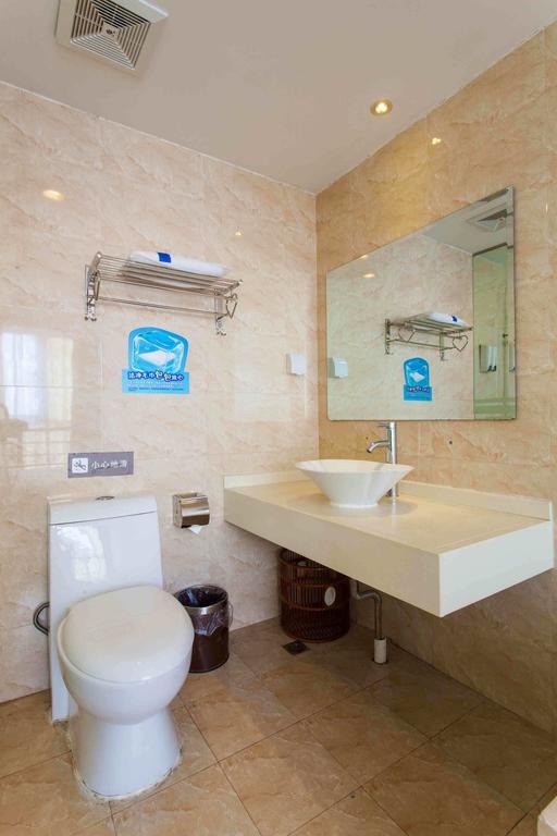 7Days Inn Luoyang Nanchang Road Wangfujing Номер фото