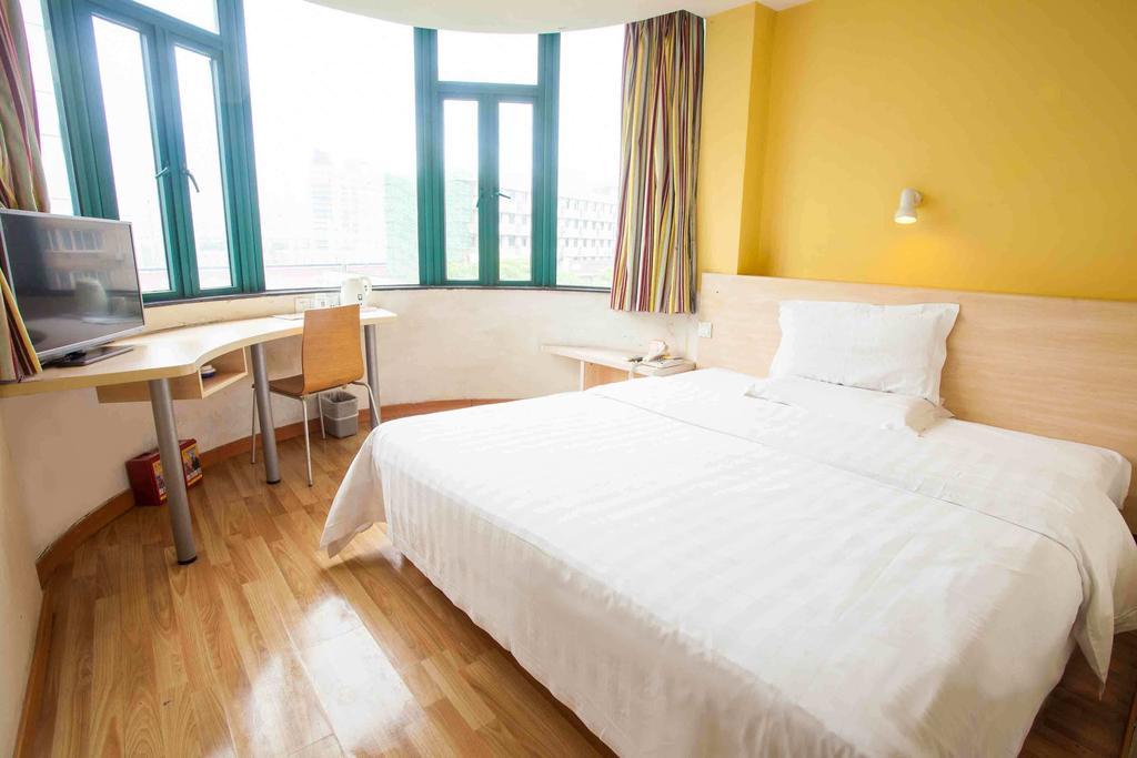 7Days Inn Luoyang Nanchang Road Wangfujing Номер фото